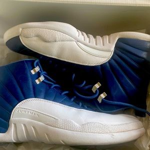 These are Jordan 12s stone blue/legend blue- Obsidian